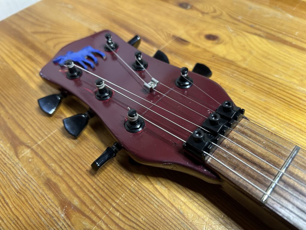 Headstock med locking nut